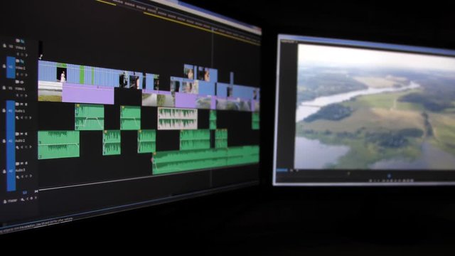 Editing and color correction video on computer.