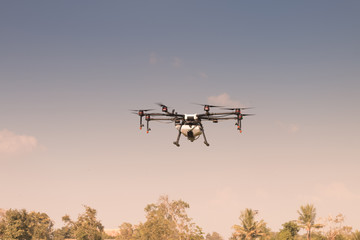 Fototapeta na wymiar Agriculture drone aircraft for farming fly on sky