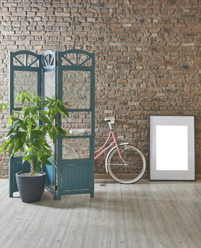 brown brick wall blu escreen and . black vase of flowers and empty frame