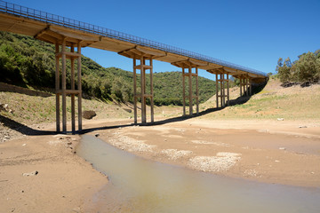 Dry river under a bridge/ effects of climate change