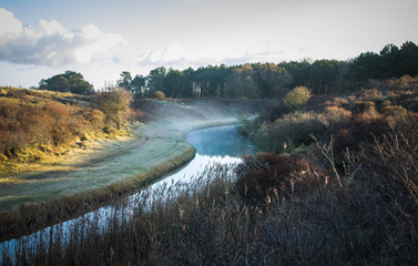 Foggy river landscape