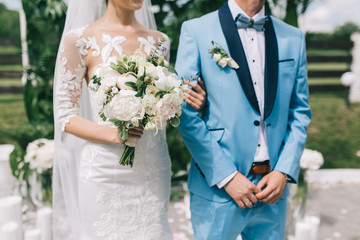 Beautiful wedding couple on the ceremony.