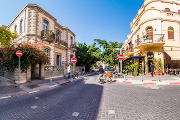 Street scene in Neve Zedek district in Tel Aviv, Israel. - obrazy, fototapety, plakaty