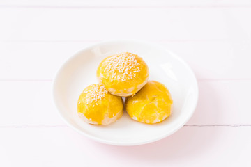 Chinese pastry or moon cake filled with mung bean paste and salted egg yolk