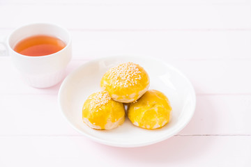Chinese pastry or moon cake filled with mung bean paste and salted egg yolk