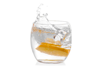 Glass of water with lemon isolated