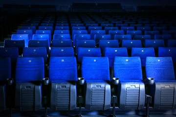 Comfy blue seats in empty cinema hall