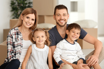 Obraz premium Happy family in new flat