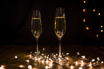 Toast by champagne glasses