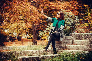 Fototapeta premium Woman taking selfie