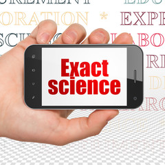 Science concept: Hand Holding Smartphone with  red text Exact Science on display,  Tag Cloud background, 3D rendering