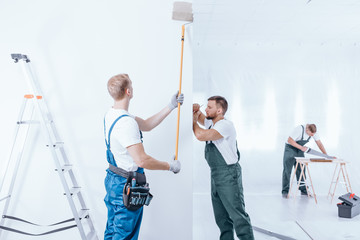 Home renovation crew finishing interior