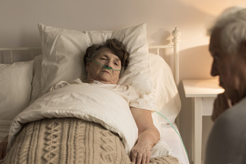 Dying elderly woman at home