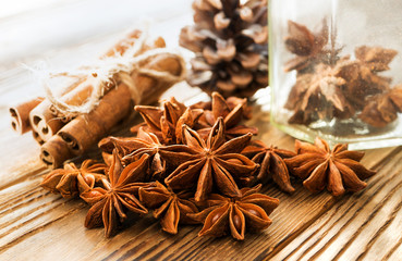 Set of spices on wooden table. Anise stars and cinnamon for flavored mulled wine