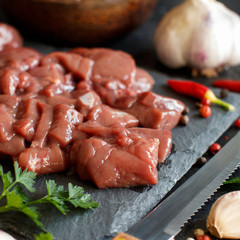 Raw beef liver with spices, herbs  and vegetables