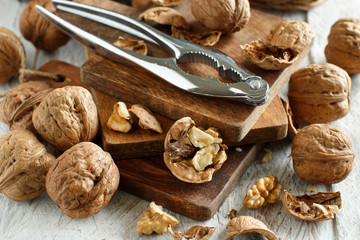 Fresh walnuts on an old wooden table