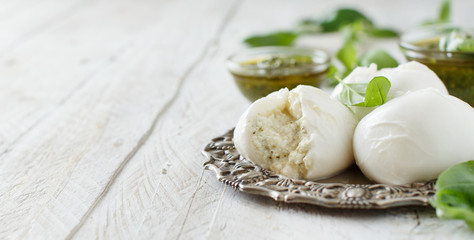 Italian mozzarella cheese stuffed with ricotta and persto