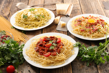 assorted plate of spaghetti and sauce