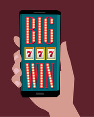 Smartphone in hand with casino app on screen