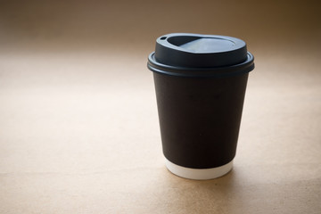 Paper cup of coffee front view