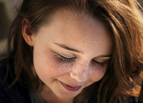 Close up portrait of girl with freckles 