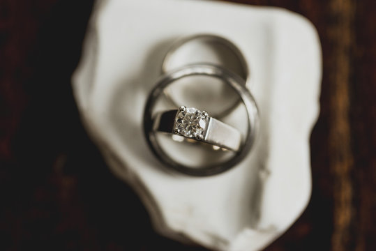 Overhead view of diamond ring on table
