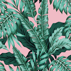 Tropical leaves green seamless pink background