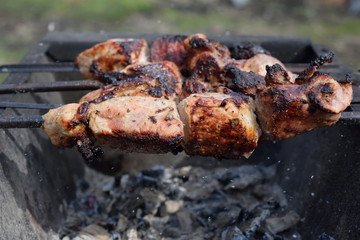 The meat is cooked on the grill