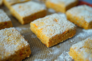 Baking square sweet potato scones with sugar on top 