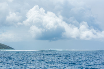 Pacific ocean, Tahiti, panorama between sea and sky, stormy weather 
