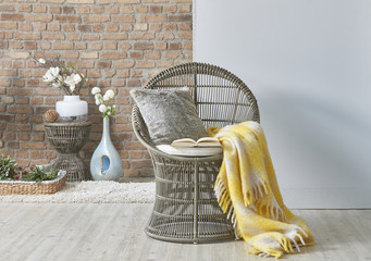 home interior living room style wicker chair pillow and yellow blanket design