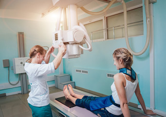 X-ray room in a hospital. Classic ceiling-mounted x-ray system.