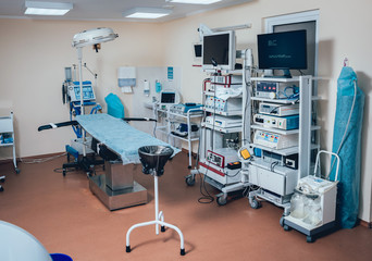 Surgical equipment and medical devices in operating room.
