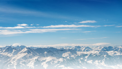 alps mountains landscape on blue gradient cloudy sky background