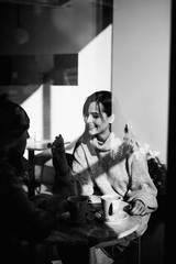 Two cheerful young loving people who drank coffee at coffee shops