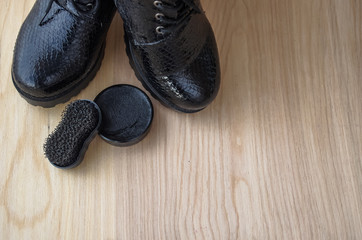 Shoes and scouring cream on the floor. Clean shoes for walking. 