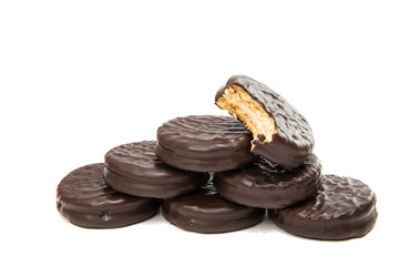 Bitten biscuit sandwich with chocolate.