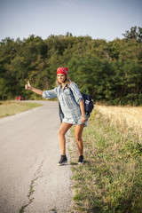 hitchhiking on a country road