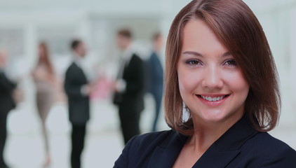 Naklejka premium Portrait of a business woman looking happy and smiling