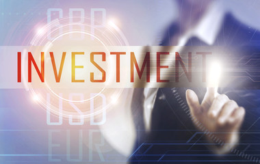 Business women touching the Investment screen