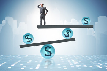 Businessman balancing in financial dollar concept