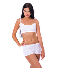 Fototapeta premium Sexy kobieta w białej odzieży fitness