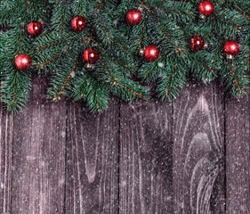 Christmas decorations on dark wooden background. Holiday decorations. Christmas background with copy space