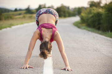 young woman exercise in nature