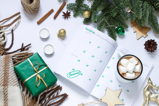 Christmas, New Year white composition with cups of hot chocolate. Winter holiday flat lay. Top view. Copy space