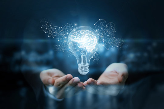 Light bulb with brain inside the hands of the businessman. Stock Photo |  Adobe Stock