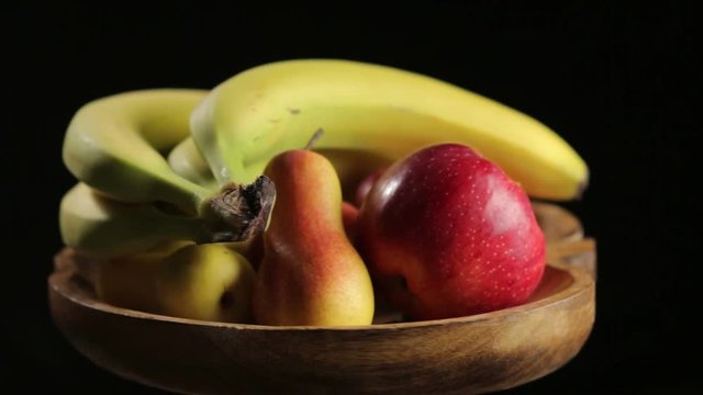 Fruits on a Wooden Plate pan left