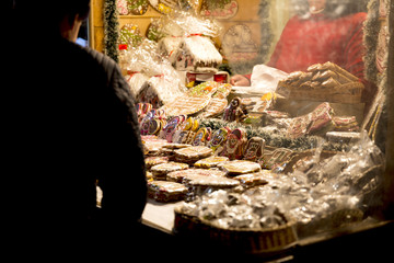 Gingerbread and sweets booth at traditional christmas street market in Latvia