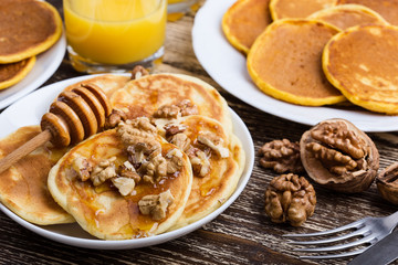 Mother's day brunch with  delicious pancakes with honey and nuts
