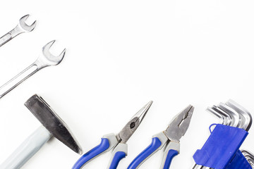 New working tools on a white background (hammer, keys, screwdriver, pliers, imbus)